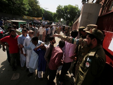 Pakistan by-elections: Initial results show tough competition between ruling PTI and opposition PML-N Pakistan by-elections: Initial results show tough competition between ruling PTI and opposition PML-N