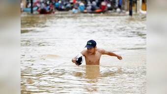 Toll in Vietnam flash floods rises to 19, disaster office says 13 people missing; disaster was triggered by Typhoon Son Tinh