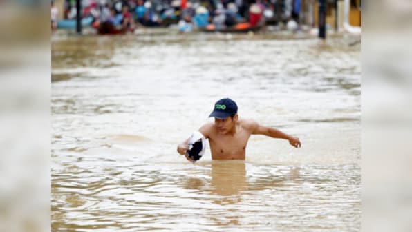 Toll in Vietnam flash floods rises to 19, disaster office says 13 people missing; disaster was triggered by Typhoon Son Tinh