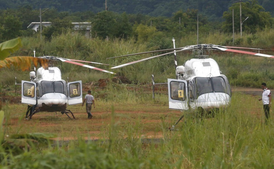 Two helicopters wait near the cave for more evacuations of the boys and their soccer coach who have been trapped since 23 June. Authorities were preparing Monday to resume the urgent, dangerous operation of extracting a youth soccer team from a flooded cave in Thailand a day after four boys were rescued. AP