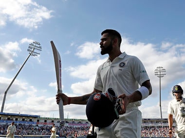 India's Captain Virat Kohli walks back to the pavilion after losing his wicket for 149 runs on the second day of the first Test cricket match between England and India at Edgbaston in Birmingham, central England on August 2, 2018. / AFP PHOTO / ADRIAN DENNIS / RESTRICTED TO EDITORIAL USE. NO ASSOCIATION WITH DIRECT COMPETITOR OF SPONSOR, PARTNER, OR SUPPLIER OF THE ECB