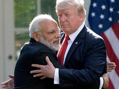 US President Donald Trump and Prime Minister Narendra Modi hug while making statements in the Rose Garden of the White House in Washington in 2017. AP
