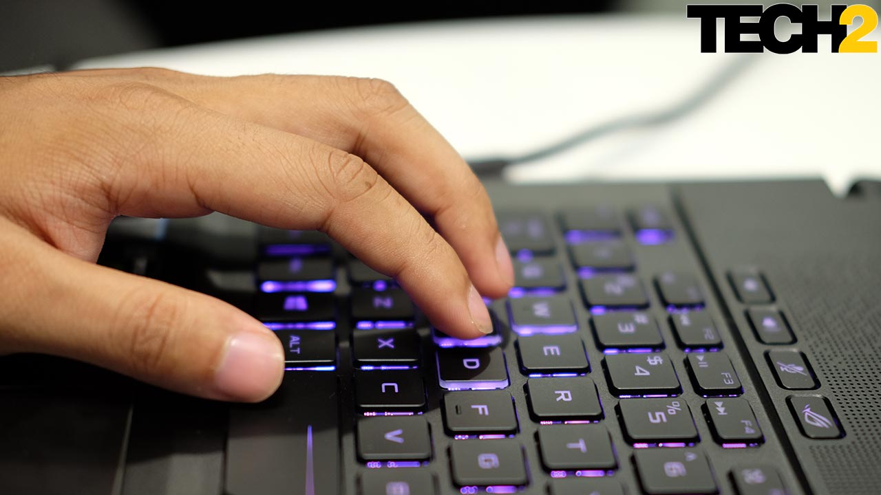 The keyboard is RGB backlit (Duh! It's an ASUS laptop) and is a bit stiff, making it comfortable for typing. Image: tech2/Anirudh Regidi