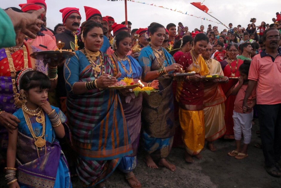 People celebrate this day during the month of Shravan on the full moon day by offering coconuts to the sea. Firstpost/Sachin Gokhale People celebrate this day during the month of Shravan on the full moon day by offering coconuts to the sea. Firstpost/Sachin Gokhale