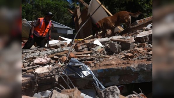 Toll in Indonesia earthquake rises to 131; rescuers intensify efforts to find people buried under rubble