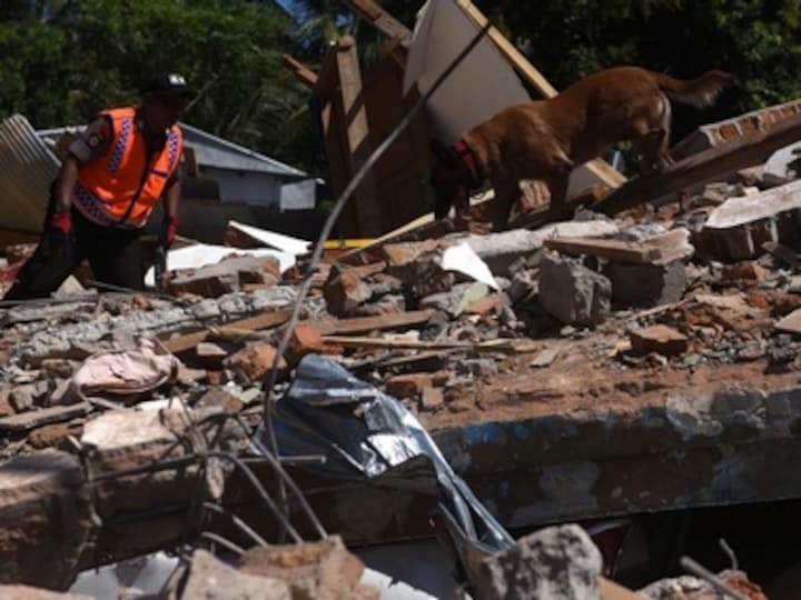 Toll in Indonesia earthquake rises to 131; rescuers intensify efforts to find people buried under rubble