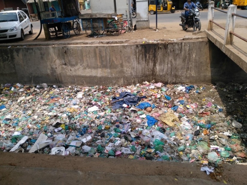 Figure 5: Canal choked with garbage, Madurai. 