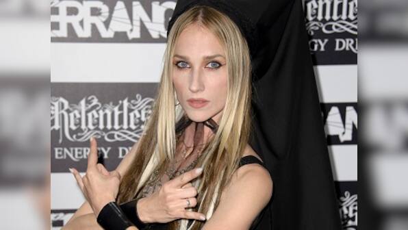 Jill Janus, lead vocalist of heavy metal band Huntress, commits suicide outside Portland, aged 43