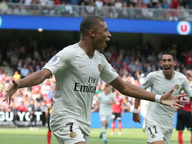 PSG's Kylian Mbappe celebrates after scoring the second goal for his team during their League One soccer match between Guingamp and Paris Saint Germain at Roudourou stadium in Guingamp, western France, Saturday, Aug. 18, 2018. (AP Photo)