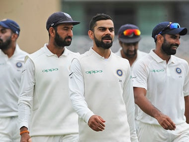 India captain Virat Kohli leads his teammates during lunch breaks on the fourth day of the third cricket match between England and India on Trent Bridge in Nottingham, England, Tuesday, August 21, 2018. (AP Photo / Rui Vieira)