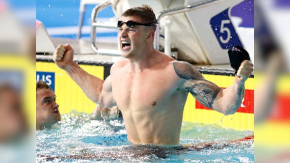 Adam Peaty breaks own world record to win gold in 100 metres breaststroke at European Championships in Glasgow