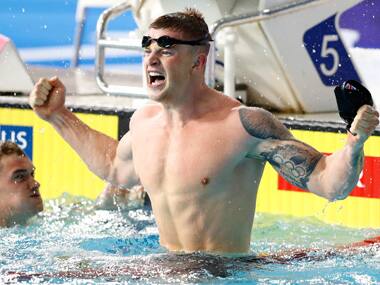 Adam Peaty breaks own world record to win gold in 100 metres breaststroke at European Championships in Glasgow