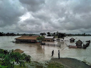 Fresh wave of floods hits Assam; Brahmaputra and tributaries flow above danger mark; four districts affected Fresh wave of floods hits Assam; Brahmaputra and tributaries flow above danger mark; four districts affected