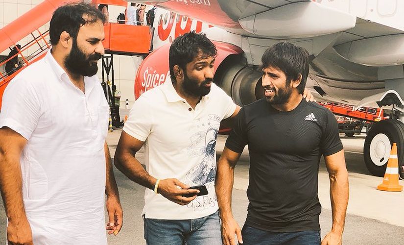 Bajrang with his mentor Yogeshwar Dutt upon returning from his gold-winning performance from Yasar Dogu International in Istanbul, Turkey last month. Image credit: Twitter/ @BajrangPunia