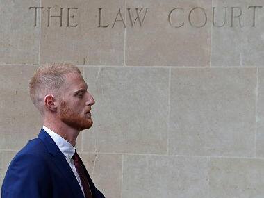 England cricketer Ben Stokes arrives for the start of his trial at Bristol Crown Court in Bristol, south-west England on August 6, 2018. Ben Stokes’s international career will be placed in suspended animation when the England cricketer appears in a Bristol court on Monday charged with affray. / AFP PHOTO / Adrian DENNIS