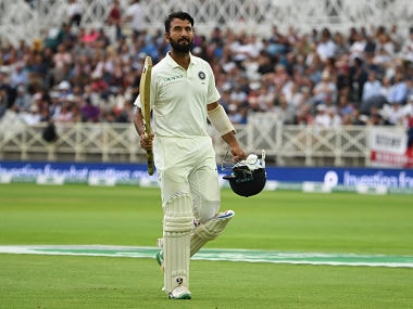 India's Cheteshwar Pujara leaves the pitch after losing his wicket for 72 runs during the third day of the third Test cricket match between England and India at Trent Bridge in Nottingham, central England on August 20, 2018. / AFP PHOTO / Paul ELLIS / RESTRICTED TO EDITORIAL USE. NO ASSOCIATION WITH DIRECT COMPETITOR OF SPONSOR, PARTNER, OR SUPPLIER OF THE ECB