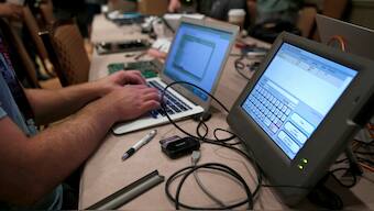 Hackers at Def Con break into voting machines to identify security flaws