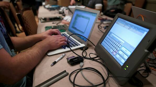 Hackers at Def Con break into voting machines to identify security flaws