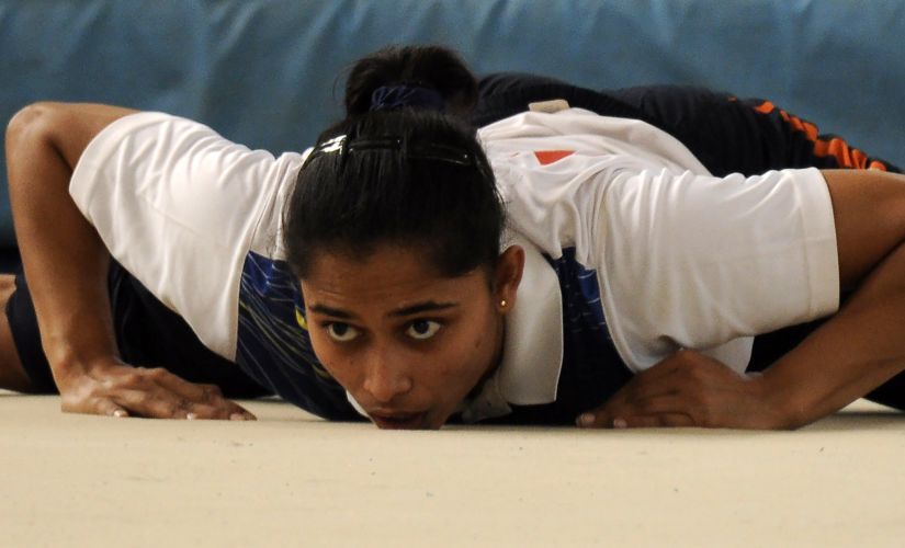 Dipa Karmakar trains at New Delhi's IG Stadium ahead of the 2016 Rio OLympics. AFP/ File