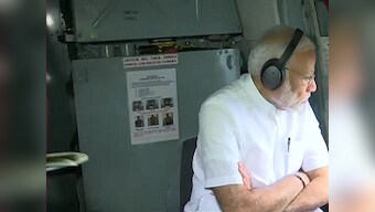 Kerala floods: Narendra Modi announces Rs 500 crore relief package after conducting aerial survey, says 'nation is with Kerala'