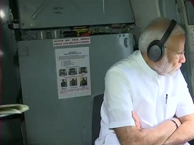 Kerala floods: Narendra Modi announces Rs 500 crore relief package after conducting aerial survey, says 'nation is with Kerala' Kerala floods: Narendra Modi announces Rs 500 crore relief package after conducting aerial survey, says 'nation is with Kerala'