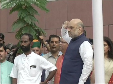 Independence Day 2018: Congress, Arvind Kejriwal taunt BJP over Amit Shah's fumble during flag hoisting at party headquarters Independence Day 2018: Congress, Arvind Kejriwal taunt BJP over Amit Shah's fumble during flag hoisting at party headquarters