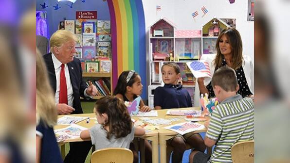 Twitter has a field day as Donald Trump adds wrong colours to American flag during visit to Ohio children's hospital
