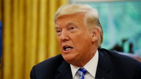 Trump attacks tech companies again, says they are 'trying to silence' people