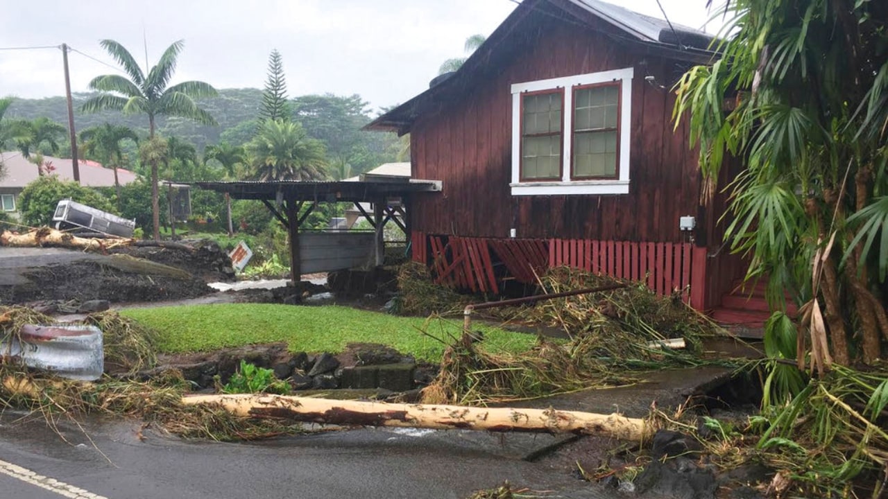 Hurricane Lane barreled toward Hawaii on Friday, dumping torrential rains that inundated the Big Island's main city. AP