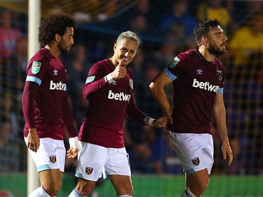 League Cup: West Ham United survive scare against 10-man Wimbledon; Cardiff, Huddersfield and Brighton ousted League Cup: West Ham United survive scare against 10-man Wimbledon; Cardiff, Huddersfield and Brighton ousted