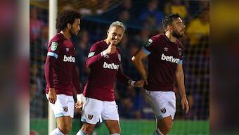 League Cup: West Ham United survive scare against 10-man Wimbledon; Cardiff, Huddersfield and Brighton ousted