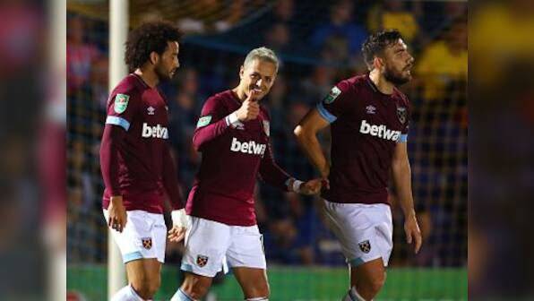 League Cup: West Ham United survive scare against 10-man Wimbledon; Cardiff, Huddersfield and Brighton ousted