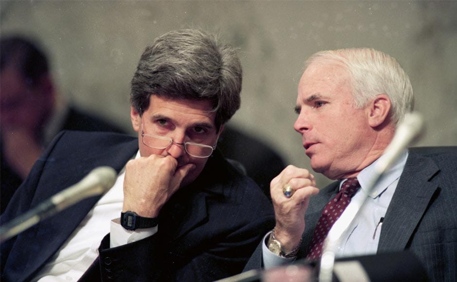 In this 1 December, 1992 file photo, Senator John Kerry is seen listening to Senator McCain during a hearing of the committee on Capitol Hill in Washington. AP In this 1 December, 1992 file photo, Senator John Kerry is seen listening to Senator McCain during a hearing of the committee on Capitol Hill in Washington. AP