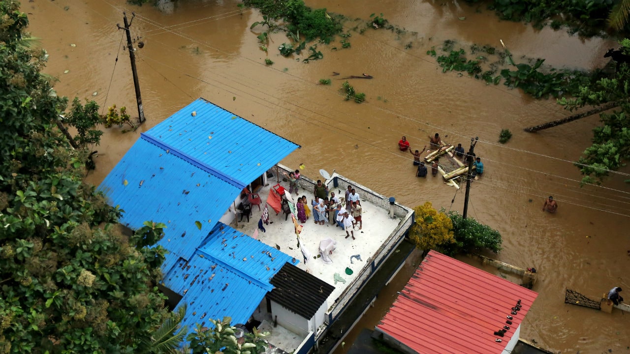 Kerala floods updates IMD withdraws red alert for Sunday Pinarayi