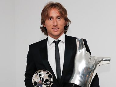 Luka Modric poses with his awards. Image courtesy: Twitter @lukamodric10