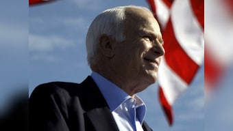 America says its final goodbye to John McCain and waits for Saturday's historic eulogy by Barack Obama and George Bush