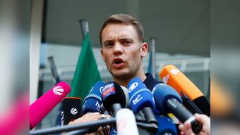 Captain Manuel Neuer denies Mesut Ozil's claims of racism within the German national team set-up