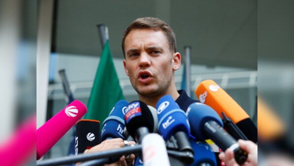 Captain Manuel Neuer denies Mesut Ozil's claims of racism within the German national team set-up