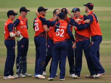 The Netherlands players celebrate the dismissal of a Nepal batsman. Image credit: Twitter/@ICC