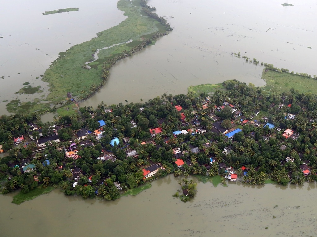 An aerial view shows partially submerged houses at a flooded area in Kerala. Reuters