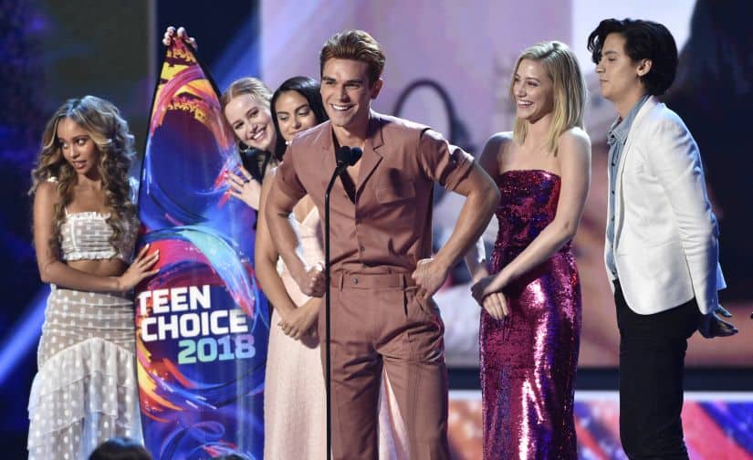 Vanessa Morgan, from left, Madelaine Petsch, Camila Mendes, KJ Apa, Lili Reinhart and Cole Sprouse accept the award for choice drama tv show for 
