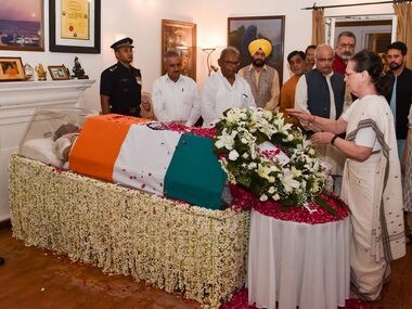 Former Congress president Sonia Gandhi pays tribute to former prime minister Atal Bihari Vajpayee, at his Krishna Menon Marg residence, in New Delhi. PTI