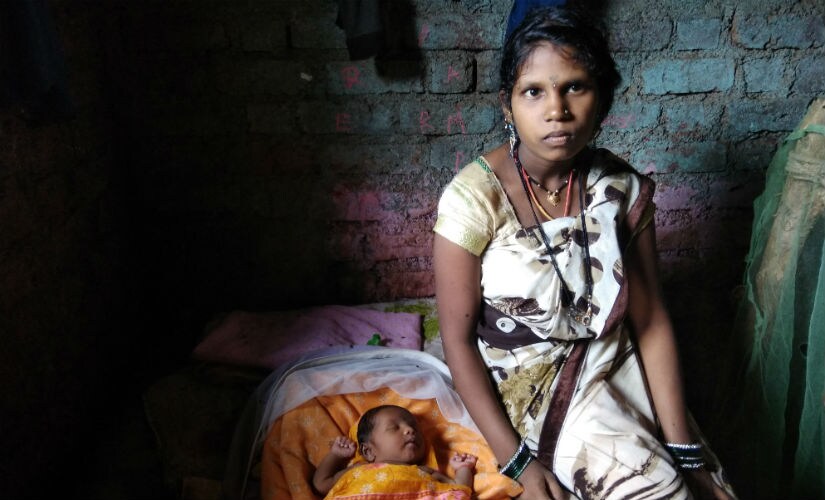 Suvarna Hilam with her son.