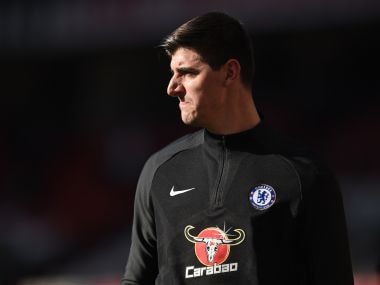 Chelsea's Belgian goalkeeper Thibaut Courtois warms up ahead of the English Premier League football match between Manchester United and Chelsea at Old Trafford in Manchester, north west England, on February 25, 2018. / AFP PHOTO / Oli SCARFF / RESTRICTED TO EDITORIAL USE. No use with unauthorized audio, video, data, fixture lists, club/league logos or 'live' services. Online in-match use limited to 75 images, no video emulation. No use in betting, games or single club/league/player publications. /