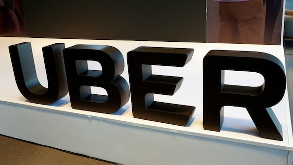 SoftBank, Toyota to invest nearly $1 billion in Uber's self-driving car unit
