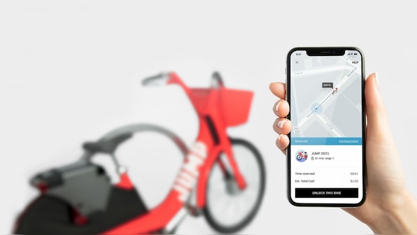 Uber ready to shift from cars to bikes with a short-term financial hit forecast