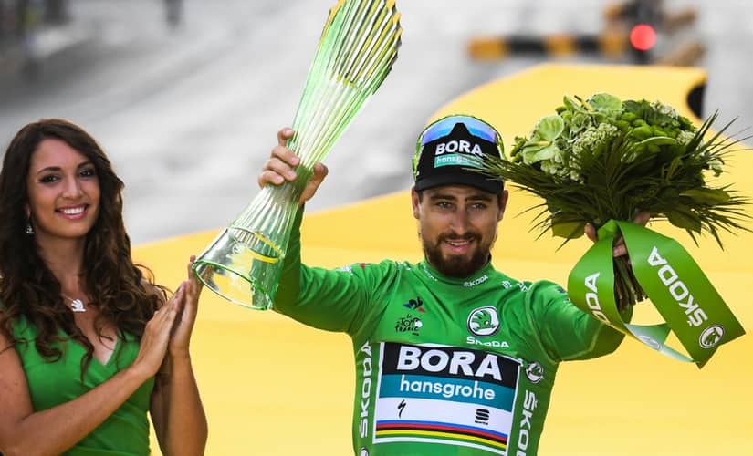 Slovakia’s Peter Sagan celebrates his overall best sprinter’s green jersey on the podium after the 21st and last stage of the 105th edition of the Tour de France. AFP 