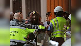 White supremacist rally in Washington massively outnumbered by counter-protesters; police uses pepper spray to contain crowd