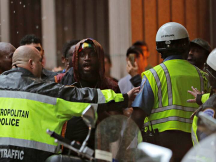 White supremacist rally in Washington massively outnumbered by counter-protesters; police uses pepper spray to contain crowd