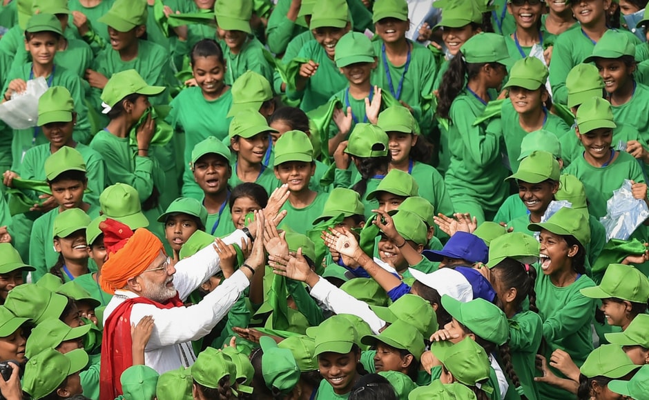 Modi interacted with children during Independence Day celebrations at the Red Fort, in New Delhi on Wednesday. PTI Modi interacted with children during Independence Day celebrations at the Red Fort, in New Delhi on Wednesday. PTI